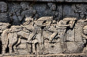 Candi Panataran - Main Temple. Krishnayana reliefs. The spoils of victory, female captives from Yawana. 